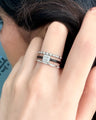 Hand with a ring on a blurred background